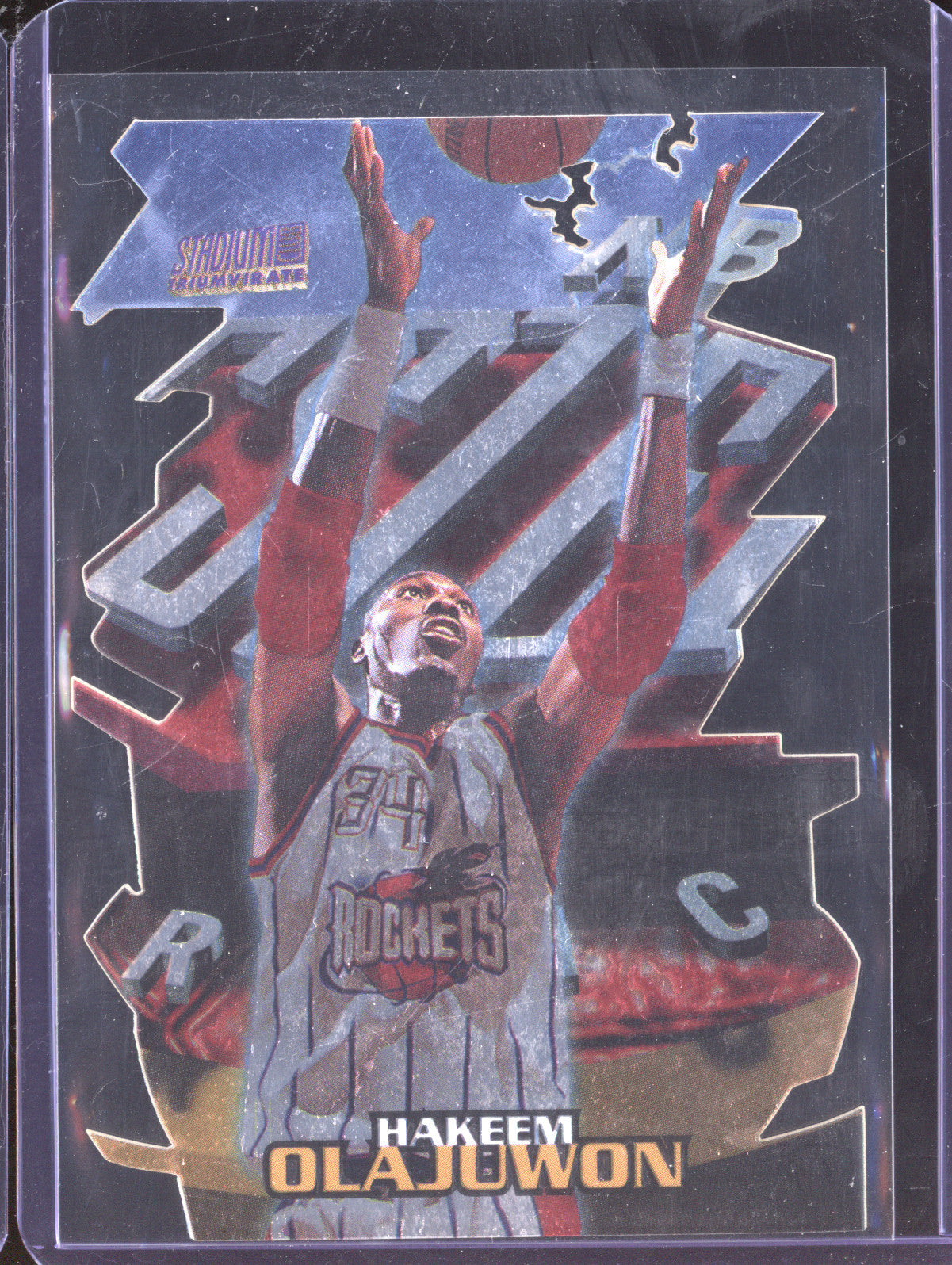 Hakeem Olajuwon 1997-98 Topps Stadium Club Triumvirate T15B