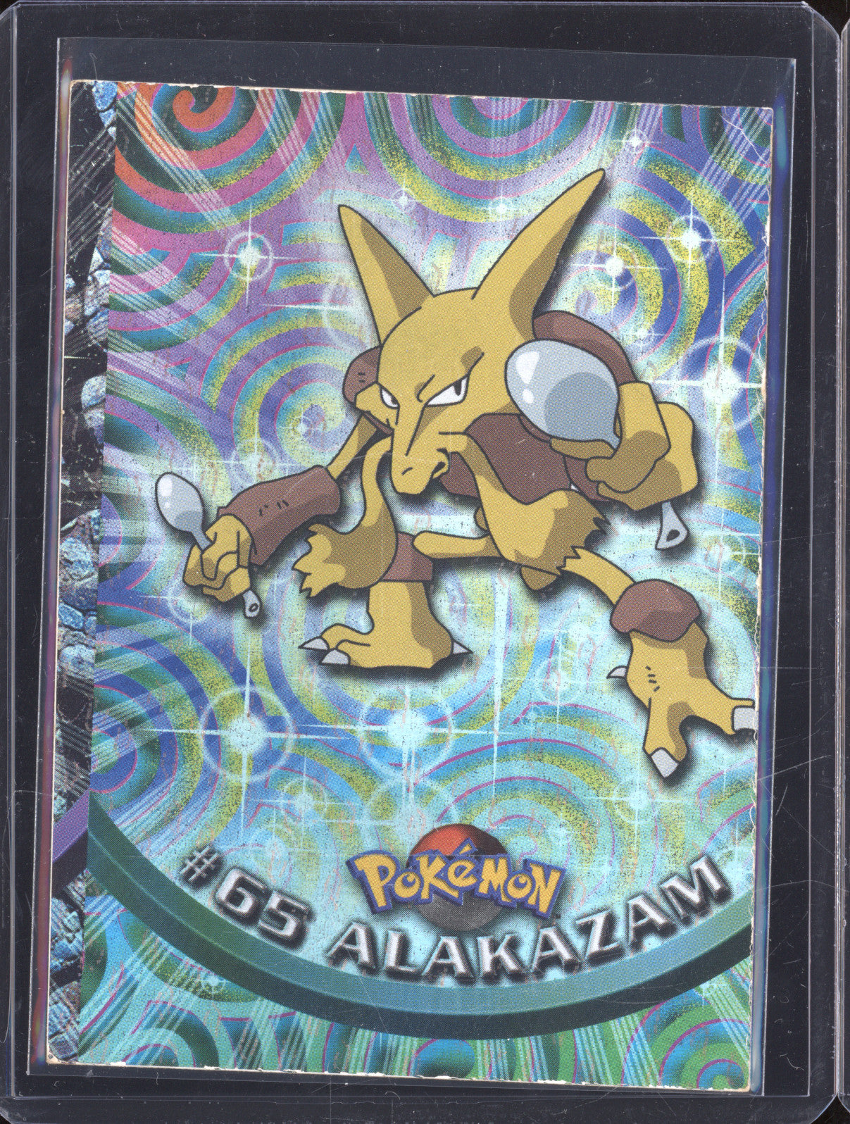 1999 Pokemon Topps Series 1 65 Alakazam Holo (Miscut Error)