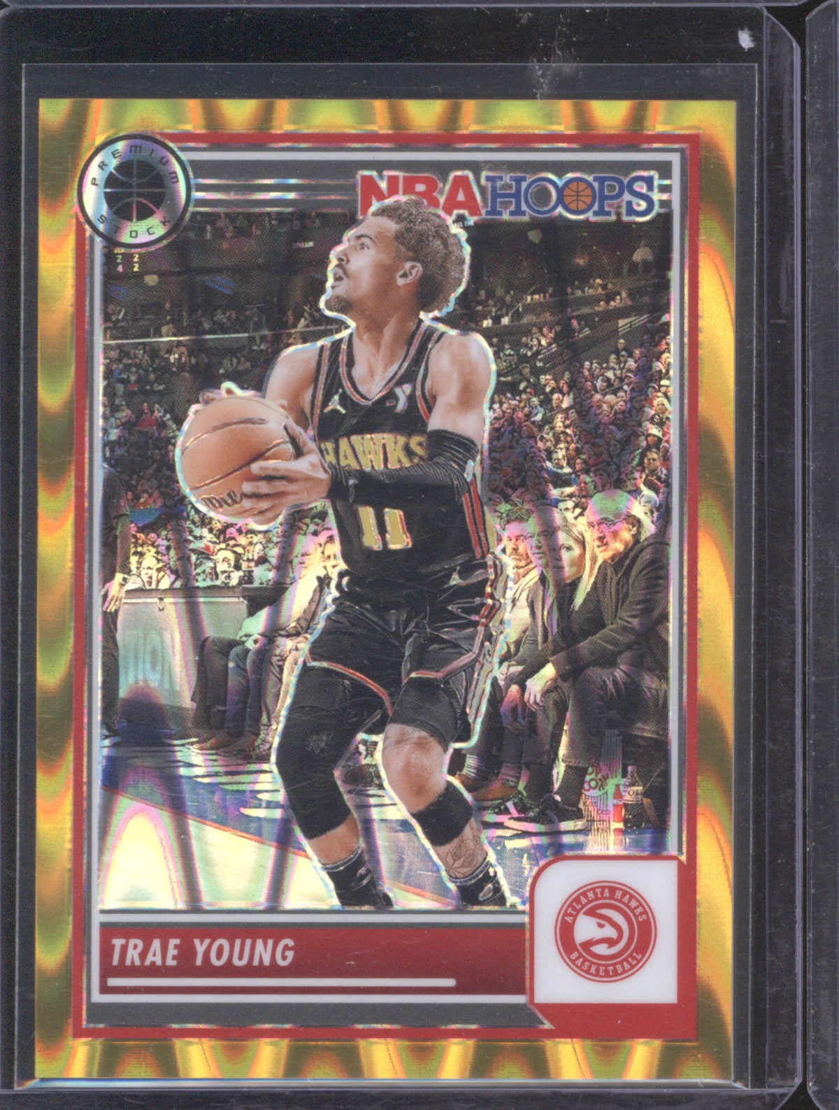 Trae Young 2023 Panini NBA Hoops Premium Stock #82 Gold RayWave Prizm /10