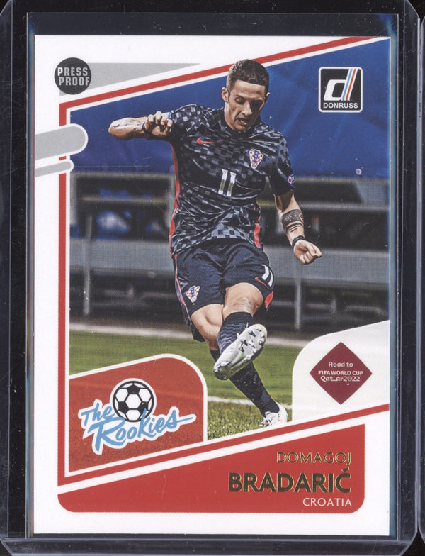 Domagoj Bradaric 2021-22 Panini Donruss Road to Qatar 12 The Rookies Press Proof RC